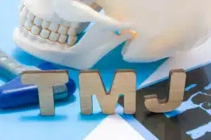 TMJ letters with skull model