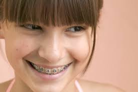 thoughtful-teenage-girl-with-braces