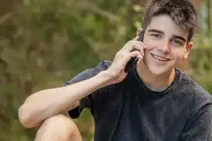 Person talking on a phone outdoors
