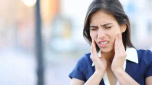 Woman with blurred face outdoors