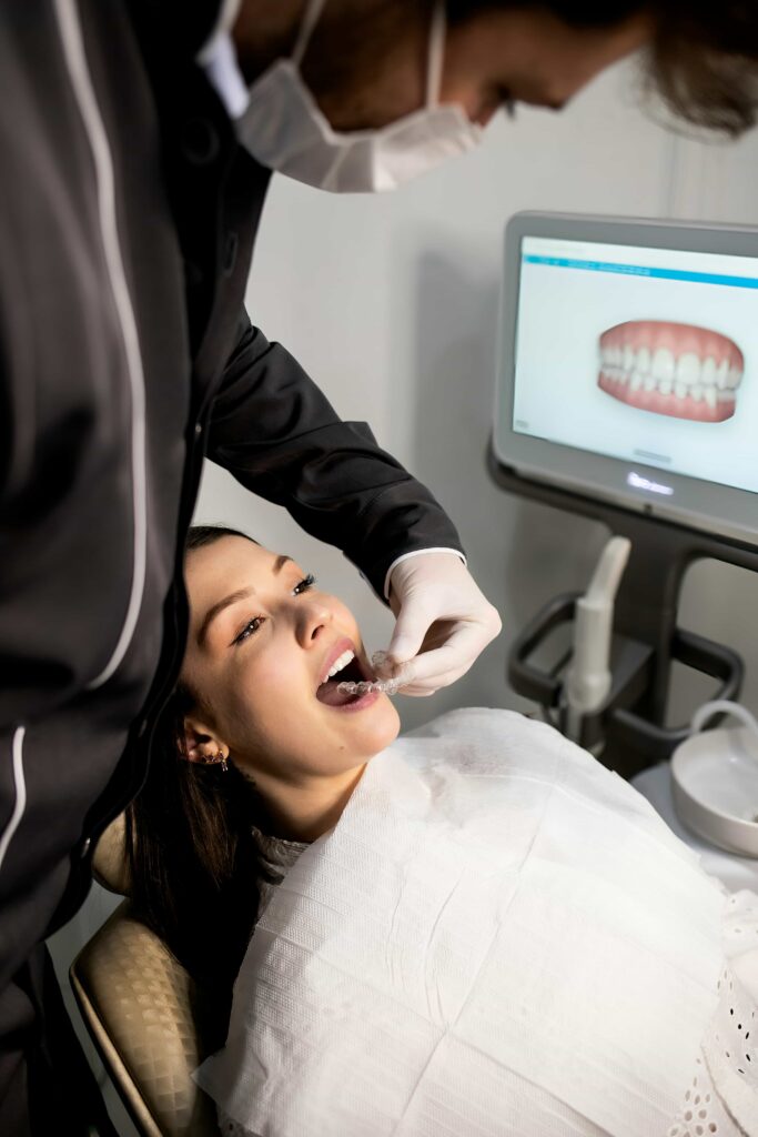 woman recieves orthodontic treatment