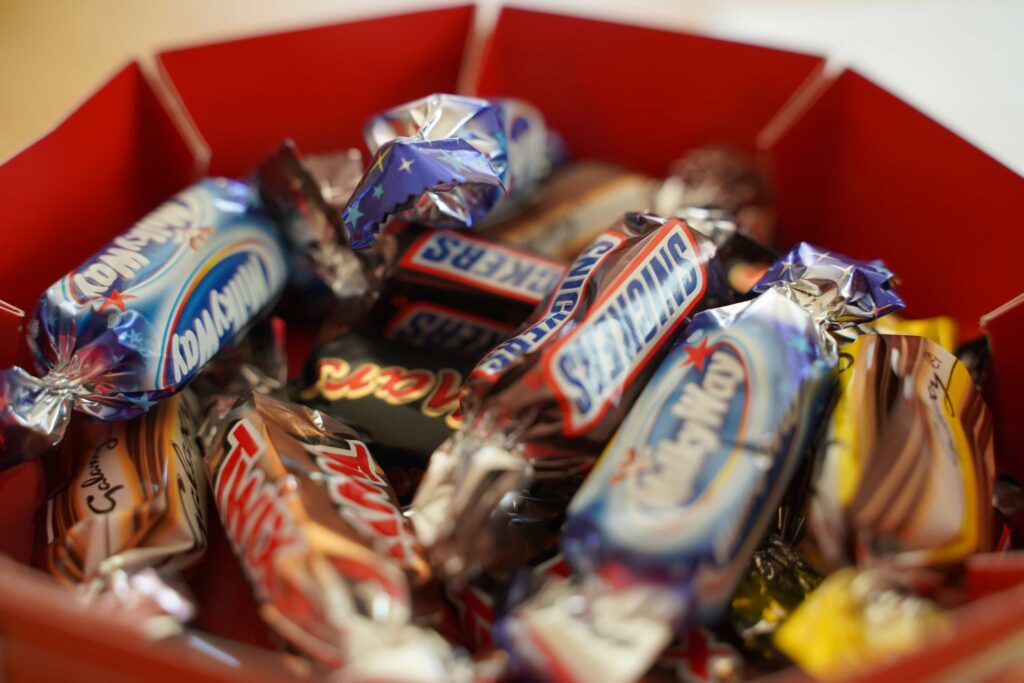 Halloween vs. Braces: Tips for a Healthy, Pain-Free Season 5 CANDY IN HALLOWEEN BUCKET
