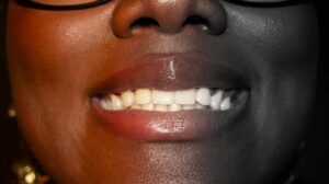 womans straight white teeth