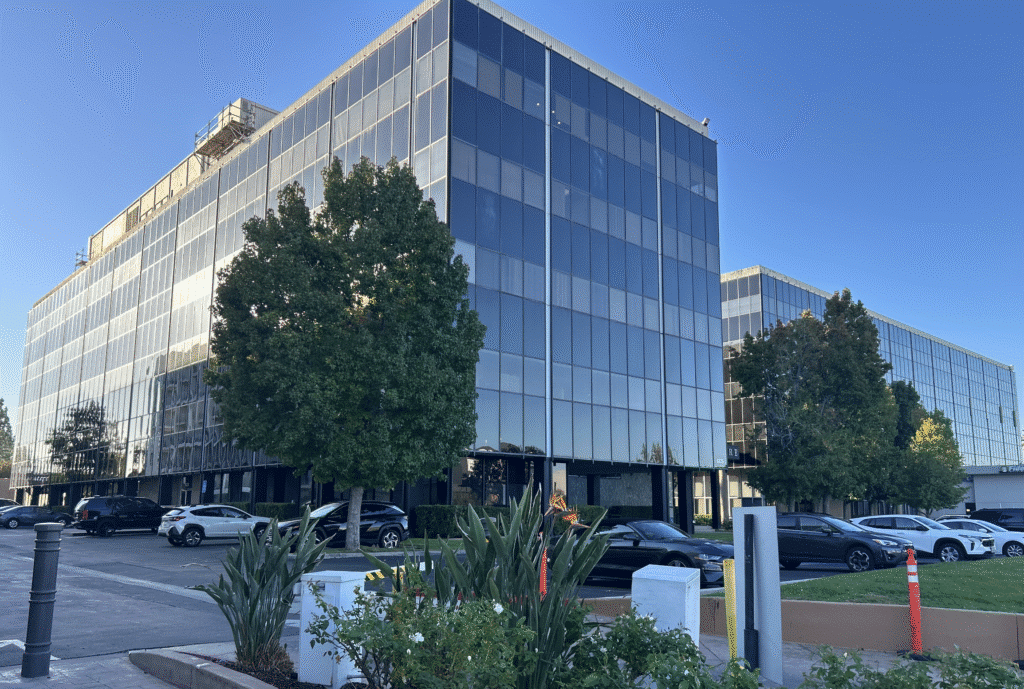 Modern office buildings with greenery.
