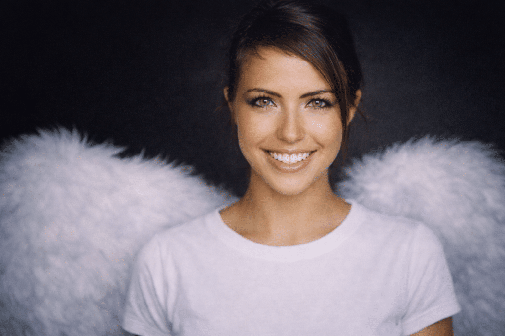 Woman with angel wings, blurred face